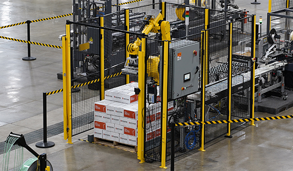 Palletizer stacking boxes on pallet